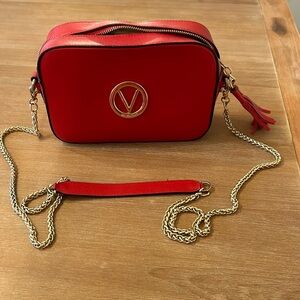 Valentino cross body bag. Red. No stains Great condition, barely ever used.